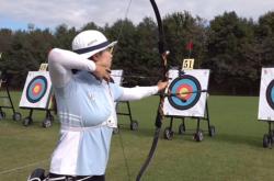 爱游戏网址-韩国射箭选手冷静应战一举夺魁